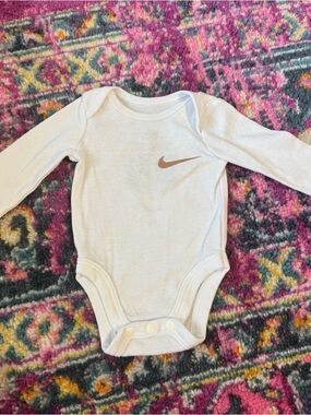 Nike Cream Long-Sleeve Baby Bodysuit with Brown Swoosh